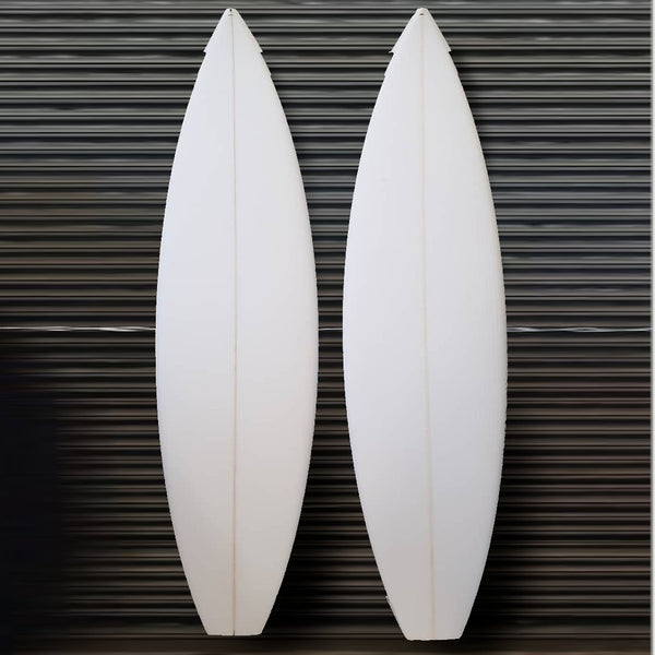2 Pre Cut CNC Surfboard Blanks resting up against the wall