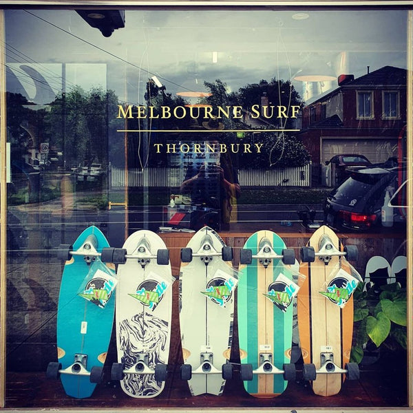 Skateboards displayed in the front of Melbourne Surfboard Shop in Thornbury