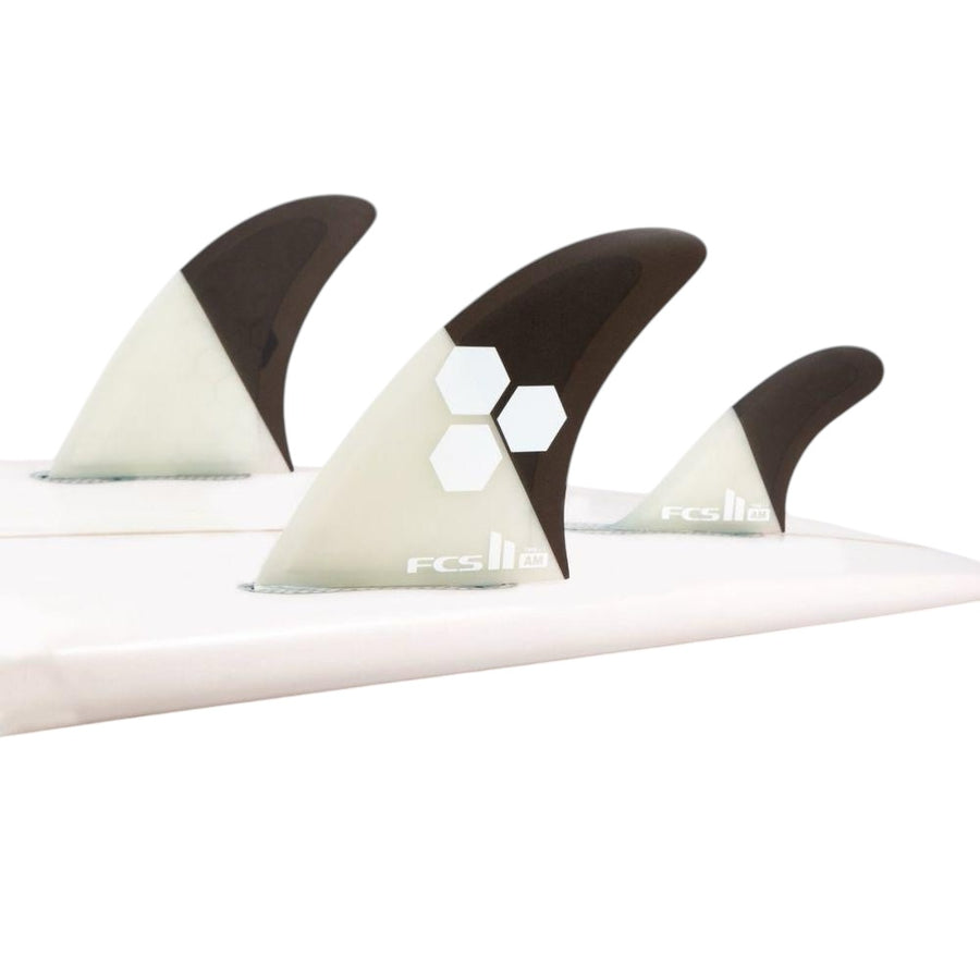 FCS II AM surfboard fins on a white surfboard, Melbourne Surfboard Shop hardware accessory