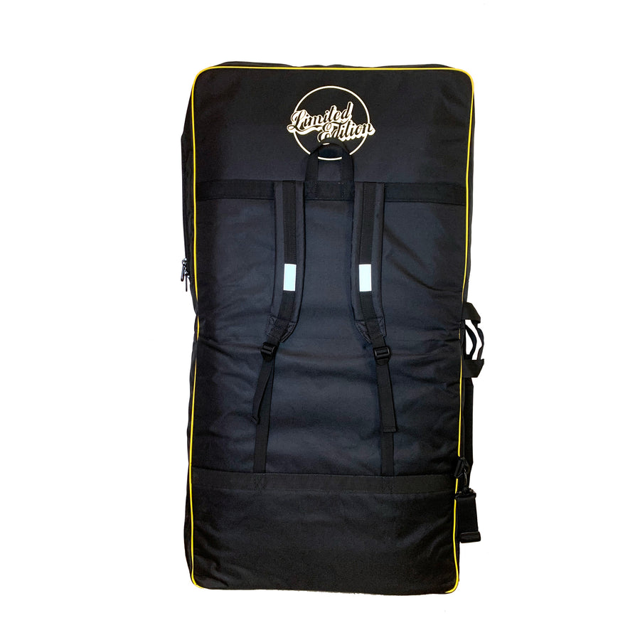 Black surfboard travel bag with yellow trim, backpack straps, and Limited Edition logo
