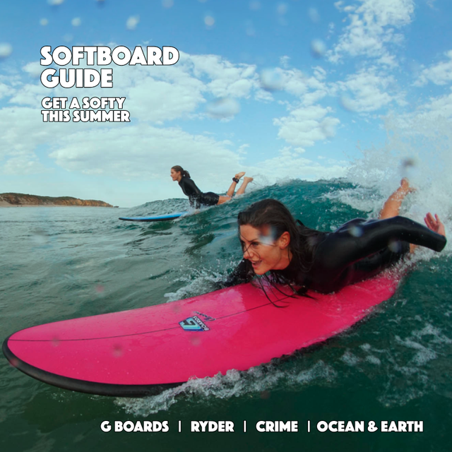 Two girls riding G Boards softboards into a medium wave with 3/2 wetsuits, with Crime, Ryder and OCean and Earth advertised.