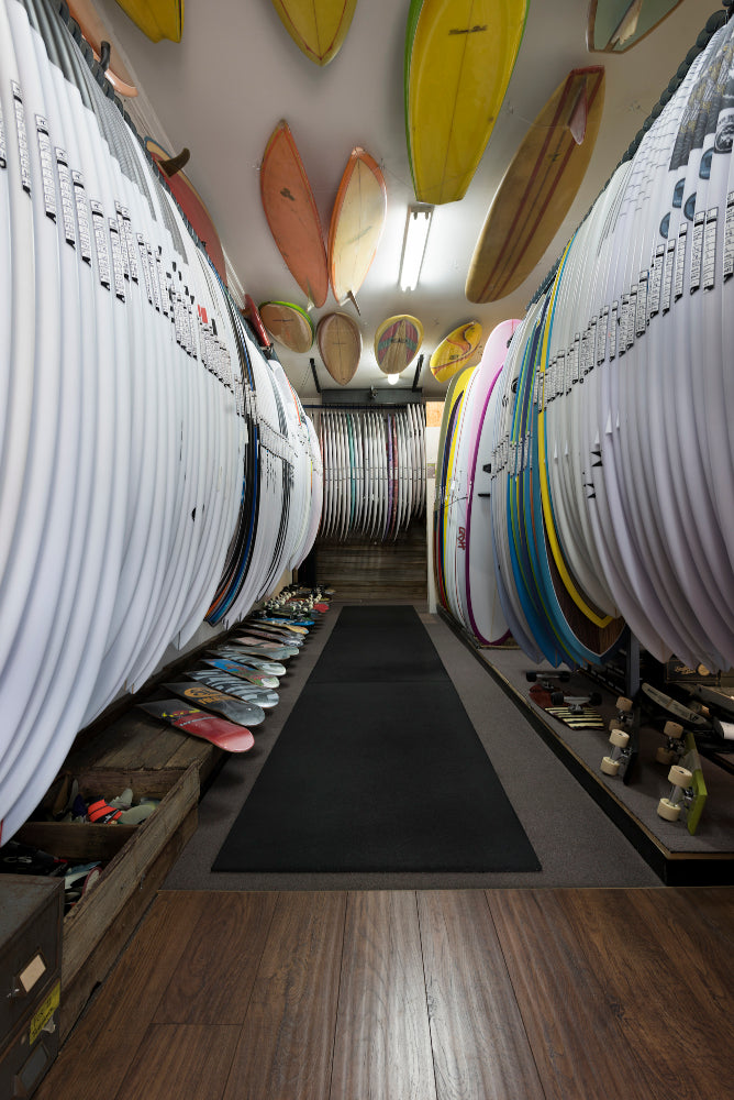 Hallway of surfboards inside Melbourne Surfboard Shop in Thornbury