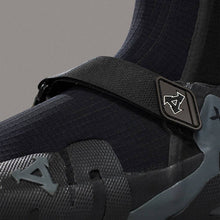 Close-up of black XCEL Drylock neoprene surf boot with strap, Melbourne Surfboard Shop