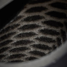 Close-up of textured wetsuit bootie lining, surf accessory at Melbourne Surfboard Shop
